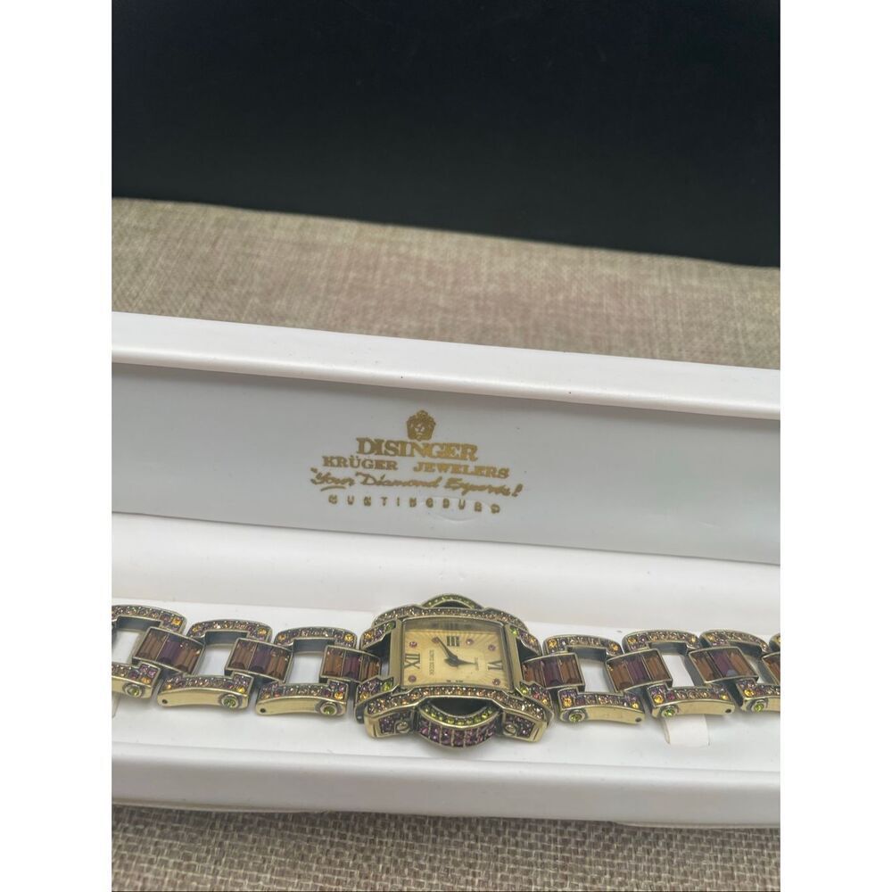Heidi Daus Crystal Embellished Bracelet Watch – Amethyst Baguettes